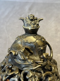 A fine Chinese tripod 'elephant' censer and cover, Ming