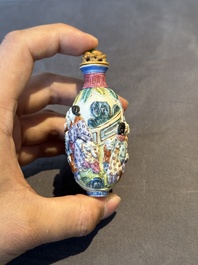 A Chinese famille rose moulded snuff bottle, Qianlong mark, late 18th/early 19th C.