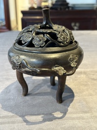 Two Chinese Chinese bronze cylindrical incense stick holders and a covered censer, Yuan/Ming and Qing