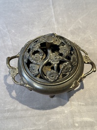 Two Chinese Chinese bronze cylindrical incense stick holders and a covered censer, Yuan/Ming and Qing