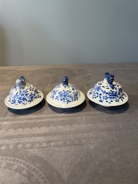 A Chinese blue and white garniture of five vases with lotus scrolls, 19th C.