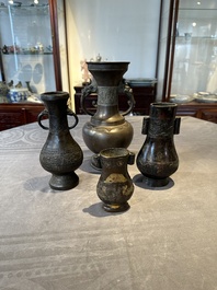 Four Chinese archaistic gilt bronze vases, Yuan/Ming