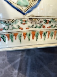 A Chinese famille verte 'figures and antiquities' jar and cover, Kangxi