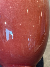 A Chinese monochrome peachbloom-glazed vase, Qianlong mark, 19/20th C.