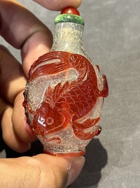 A group of seven Chinese red-overlay glass and red glass snuff bottles, 19/20th C.