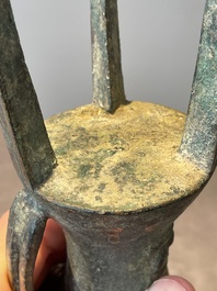 Three Chinese archaic bronze wine vessels, Zhou or later