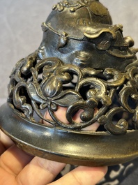 A fine Chinese tripod 'elephant' censer and cover, Ming
