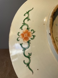 A Chinese famille verte and a famille rose dish with birds among blossom branches, 19th C.