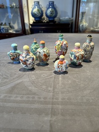 Eight Chinese moulded famille rose snuff bottles, Qianlong mark, 19th C.
