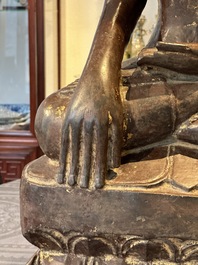 A Burmese lacquered and gilt wooden Buddha, 17/18th C.