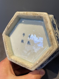 A pair of Chinese blue and white hexagonal jars and covers with a lady holding a fan, 19th C.