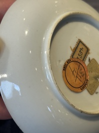 A Chinese gilt-decorated grisaille armorial cup and saucer, Qianlong