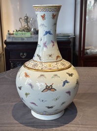 A Chinese famille rose 'butterfly' bottle vase, Guangxu mark and of the period