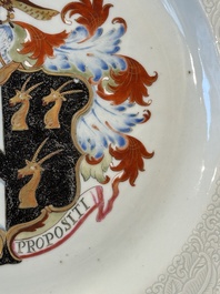 A Chinese famille rose armorial dish with incised rim for the English market with the arms of Willes Impaling Broster, Qianlong