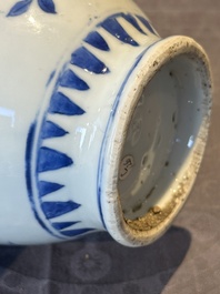 A Chinese blue and white vase with floral design and two handles, Transitional period