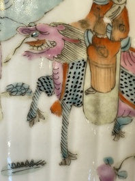 A pair of Chinese famille rose jars and covers with figures in a garden, Tongzhi mark and of the period
