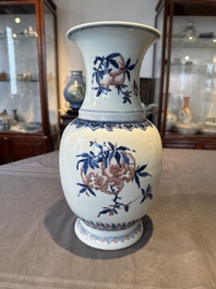 A Chinese blue, white and copper-red 'Three abundances' or 'Sanduo' vase, 19/20th C.
