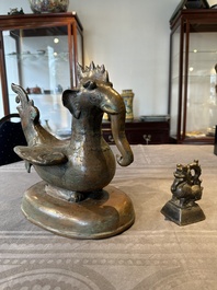 A large bronze sculpture and an opium weight in shape of Hintha or Hamsa, Burma/India, 17/18th C.