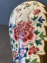 A Chinese capucin-brown-ground famille rose garniture of five vases with floral design, Qianlong