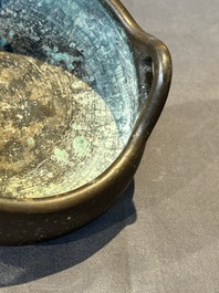 A Chinese bronze tripod censer, Guan Huai Tang Zhu Ren 冠槐堂主人 mark, 17/18th C.