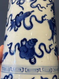 A Chinese celadon-ground slib design 'dragon' vase and Chinese blue and white vase or incense container, 19th C.
