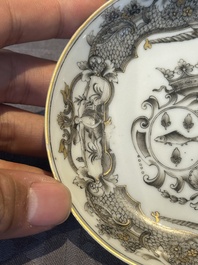 A Chinese gilt-decorated grisaille armorial cup and saucer, Qianlong