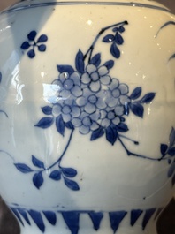 A Chinese blue and white vase with floral design and two handles, Transitional period