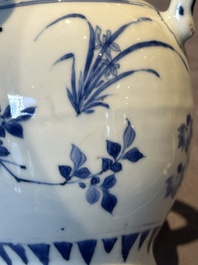 A Chinese blue and white vase with floral design and two handles, Transitional period