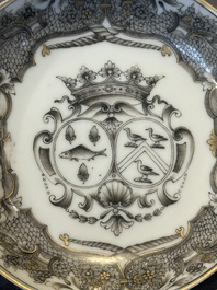 A Chinese gilt-decorated grisaille armorial cup and saucer, Qianlong
