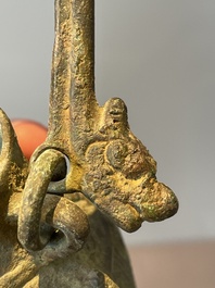 A varied collection of five Chinese bronze objects, 4th C. B.C./15th C.