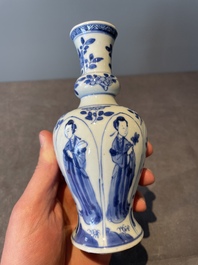 A Chinese blue and white vase, a covered bowl and six saucers, Chenghua and artemisia leaf mark, Kangxi