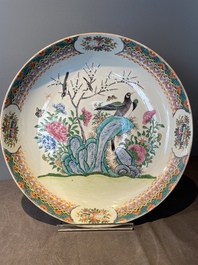 A Chinese famille verte and a famille rose dish with birds among blossom branches, 19th C.