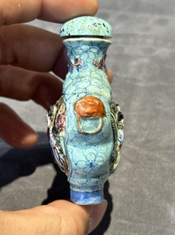 Eight Chinese moulded famille rose snuff bottles, Qianlong mark, 19th C.