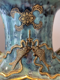 A pair of Chinese robin's egg and faux bronze-glazed 'hu' vases, Qianlong mark, 19th C.