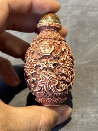 Six Chinese famille rose moulded snuff bottles, Qianlong mark, 19/20th C.