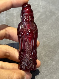A group of seven Chinese red-overlay glass and red glass snuff bottles, 19/20th C.