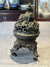 A fine Chinese tripod 'elephant' censer and cover, Ming
