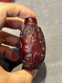A group of seven Chinese red-overlay glass and red glass snuff bottles, 19/20th C.