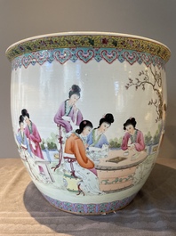 A Chinese famille rose jardiniere with ladies in a garden, 20th C.