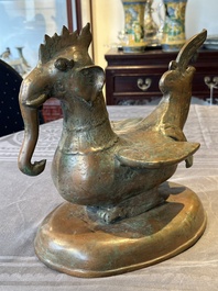 A large bronze sculpture and an opium weight in shape of Hintha or Hamsa, Burma/India, 17/18th C.