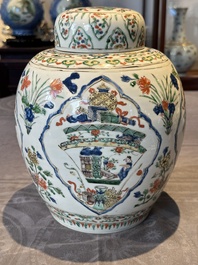 A Chinese famille verte 'figures and antiquities' jar and cover, Kangxi