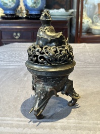 A fine Chinese tripod 'elephant' censer and cover, Ming