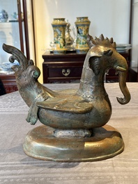 A large bronze sculpture and an opium weight in shape of Hintha or Hamsa, Burma/India, 17/18th C.