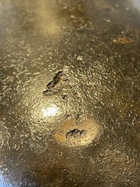 A pair of Chinese bronze 'hu' vases with Taotie design, Song/Yuan