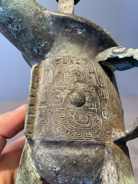 Three Chinese archaic bronze wine vessels, Zhou or later