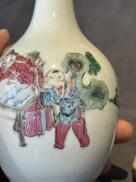 A pair of Chinese famille rose vases with figural design mounted as lamps, 19th C.