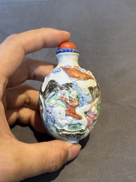 Six Chinese moulded famille rose snuff bottles, Qianlong mark, 19th C.