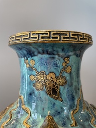 A pair of Chinese robin's egg and faux bronze-glazed 'hu' vases, Qianlong mark, 19th C.