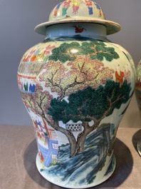A pair of Chinese famille rose 'hundred boys' vases and covers on wooden stands, 19th C.