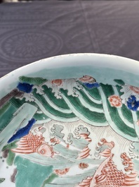 A Chinese famille verte 'leaping carps' dish, artemisia leaf mark, Kangxi